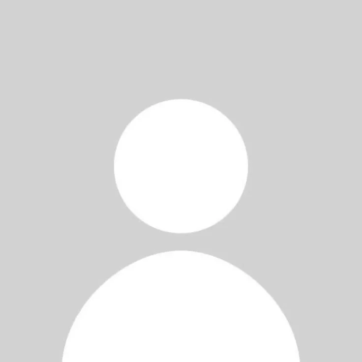 Minimalist white silhouette of a person's head and shoulders against a solid gray background.
